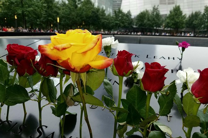 9/11 Memorial at World Trade Center and Financial District Walking Tour - Trinity Church’s cemetery connection and Liberty Park’s Sphere
