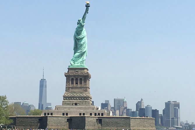Ellis Island Statue of Liberty and 9/11 Memorial Pools Tour - One World Trade Center grounds and the Freedom Tower view