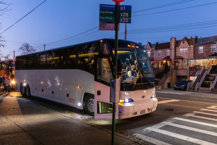 From Manhattan: 4-Hour Dyker Heights Holiday Lights Bus Tour - DUMBO viewpoints on the way back, ending near Bryant Park