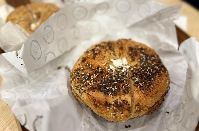 Iconic NYC Breakfast Food & Landmark Tour: Coffee, Bagel, Donut + - Toasties on East 51st: Bacon, Egg, and Cheese on a Kaiser Roll