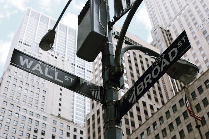 Lower Manhattan & 9/11 Memorial Exclusive Guided Walking Tour - Bowling Green to Wall Street icons: bull, park, and famous bronze