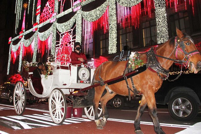 Magical Evening Horse-Drawn Carriage through NYC (65 min) - Rockefeller Center at night, with the illuminated wow factor