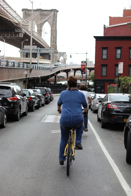 New York City: City Highlights Guided Bike or eBike Tour - Charging Bull and the downtown photo rhythm in Little Italy and Chinatown
