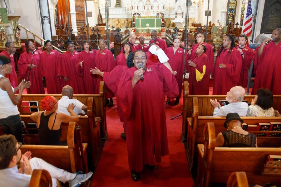 New York City Harlem Highlights w/ Gospel Concert & Transfer - Harlem from the road: Apollo Theatre and the Schomburg Center
