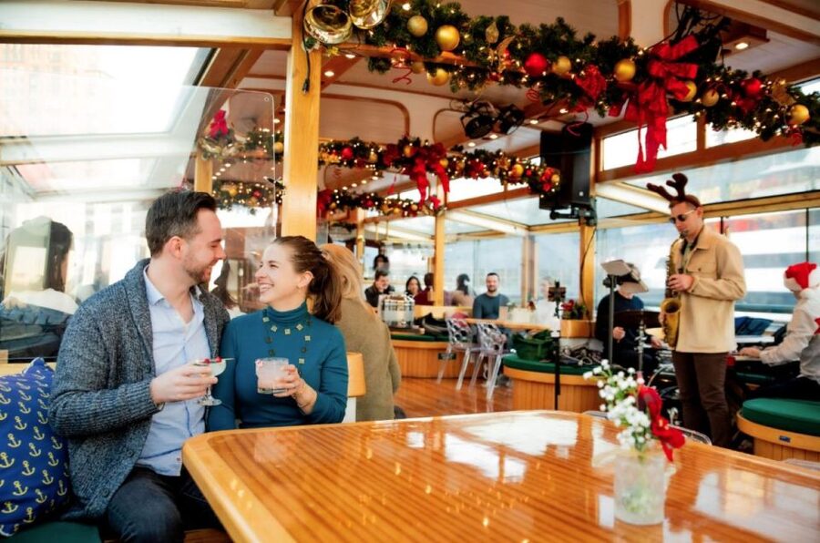 New York City: Holiday Jazz Classic Motor Yacht Cruise - Governors Island and the Statue of Liberty close pass