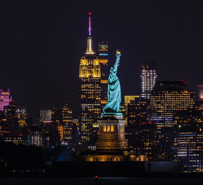 New York City Night Skyline Tour by Helicopter - Lower Manhattan Lighting: Statue of Liberty, Ellis Island, and One World Trade Center