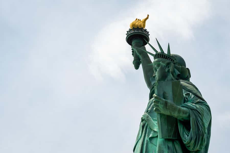 New York City: Statue of Liberty & Ellis Island Guided Tour - Liberty Island: museum access, close-up views, and where your photos come from