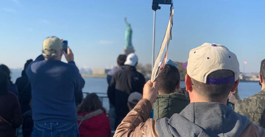 NYC: 9/11 Memorial, Wall Street, and Statue of Liberty Tour - Lower Manhattan Financial District and the Charging Bull Photo Stop