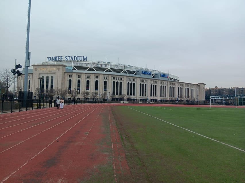 NYC: Contrasts of Bronx, Queens, Brooklyn, & Manhattan Tour - The Bronx: murals, Joker Stairs, and Yankees Stadium from the road