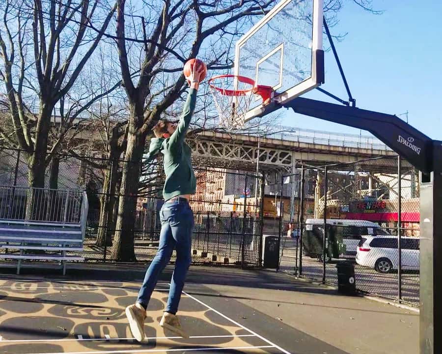 NYC Contrasts Tour: Harlem, Bronx, Bushwick, Queens, and Brooklyn - Malcolm X Boulevard and brownstone Harlem: daily life plus basketball culture