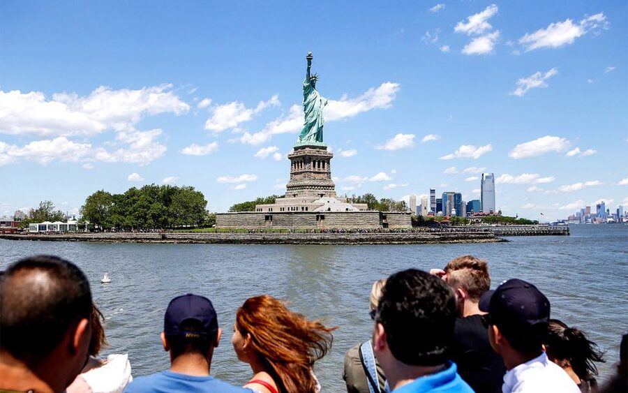 NYC: Ellis Island Private Tour with Liberty Island Access - Museum of Immigration access and the archive search moment