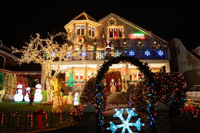 NYC Holiday Lights and Dyker Heights Luxury Bus Tour - Hudson Yards glow: The Vessel and holiday shopping energy