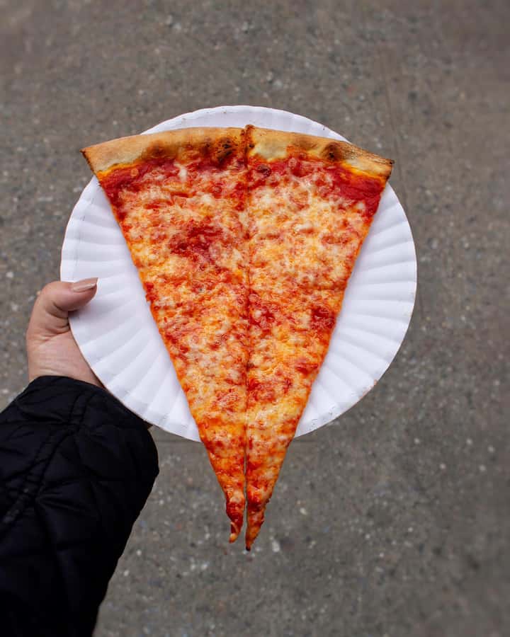 NYC: Private Upper East Side Guided Food Tour - Stop-by-stop: bagels, pizza, dumplings, lemonade spritz, and cookie