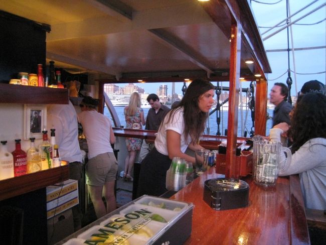 NYC: Statue of Liberty Day Sail with Onboard Bar - Governors Island: a calmer harbor beat in the middle of the cruise
