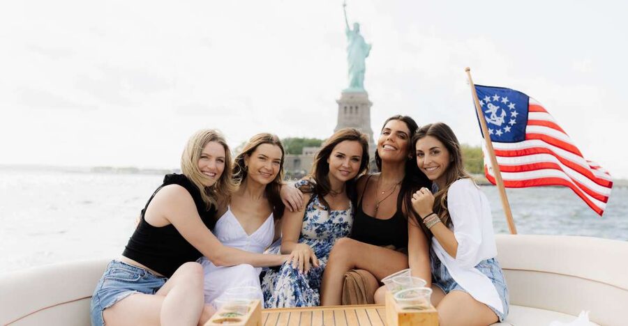 NYC: Statue of Liberty Private Yacht Tour - Onboard comfort: canopy shade, good seating flow, and simple amenities