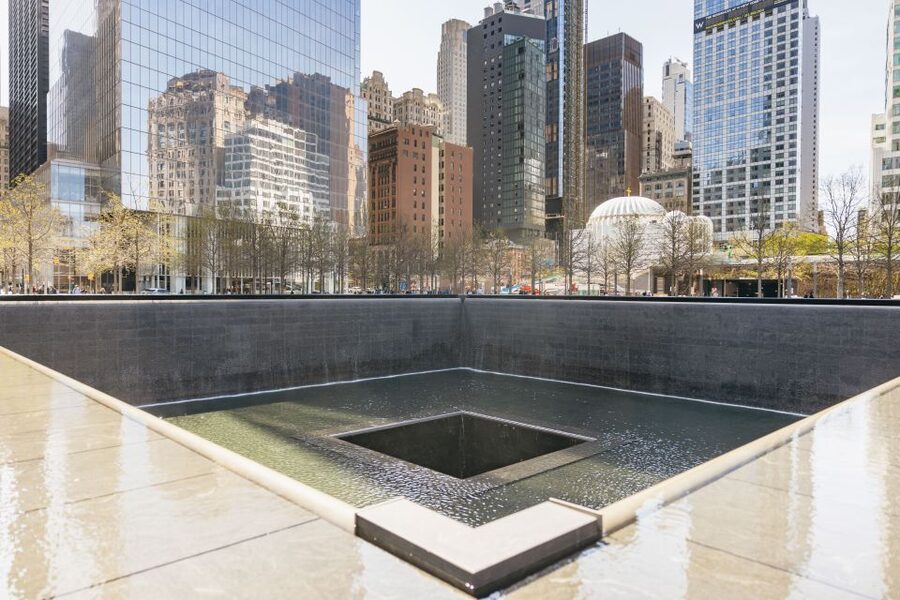 NYC: Wall Street Tour with 9/11 Memorial and Statue Ferry - Starting in the Financial District, where NYC’s power gets a street map