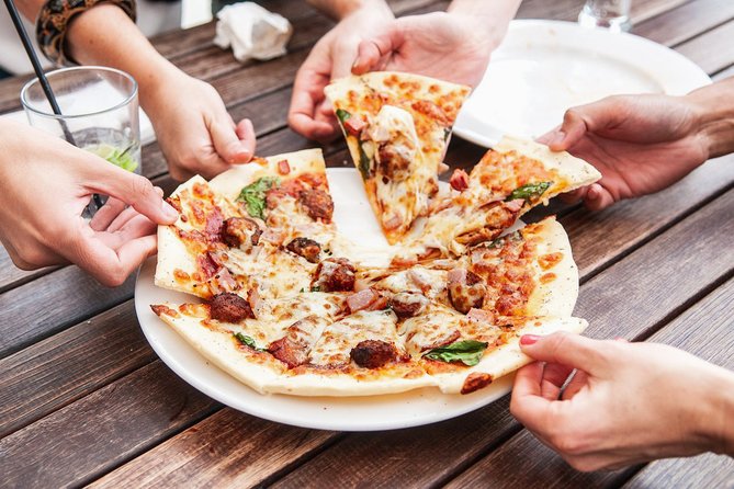 Pizza Walking Tour in Manhattan with Friendly Local Guide - Stop by stop: what each slice stop teaches you
