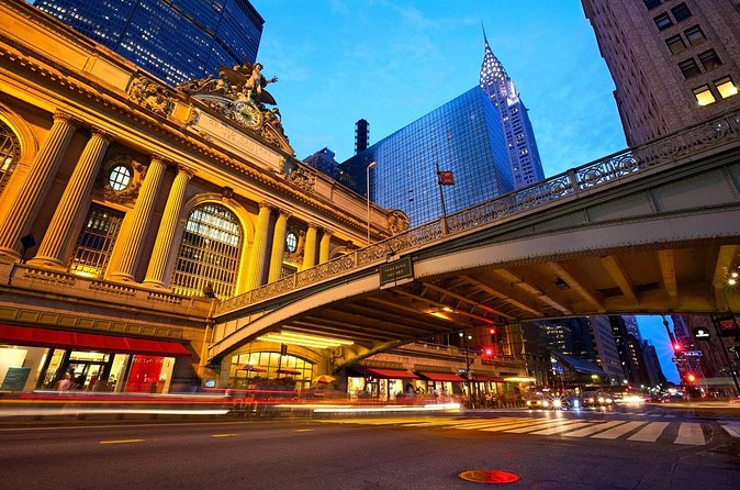 Skyline Night Bus Audio Narrated Tour Experience - Gothic Cathedral and a Major Transportation Hub After Dark