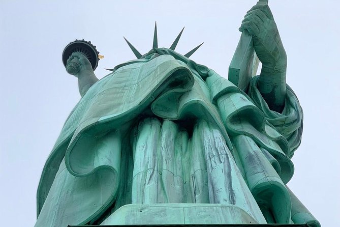 Statue of Liberty and Ellis Island Tour Semi-Private 8ppl Max - Battery Park to Castle Clinton, with harbor views you can actually use