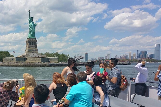 Statue Of Liberty & Ellis Island Skip The Queue Audio Guide Tour - Ferry ride to Liberty Island: skyline views plus onboard storytelling
